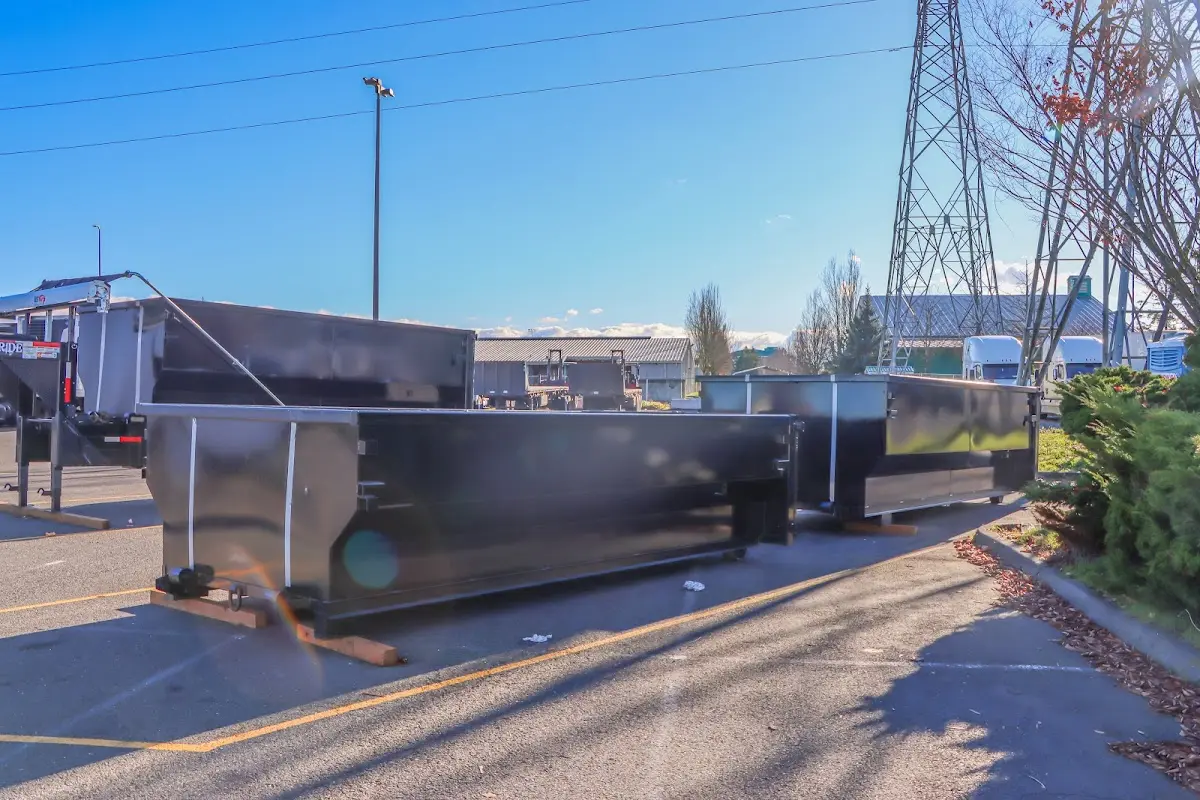 Roll-off dumpster ready for waste disposal at job site for Construction Dumpster Rental in Abington